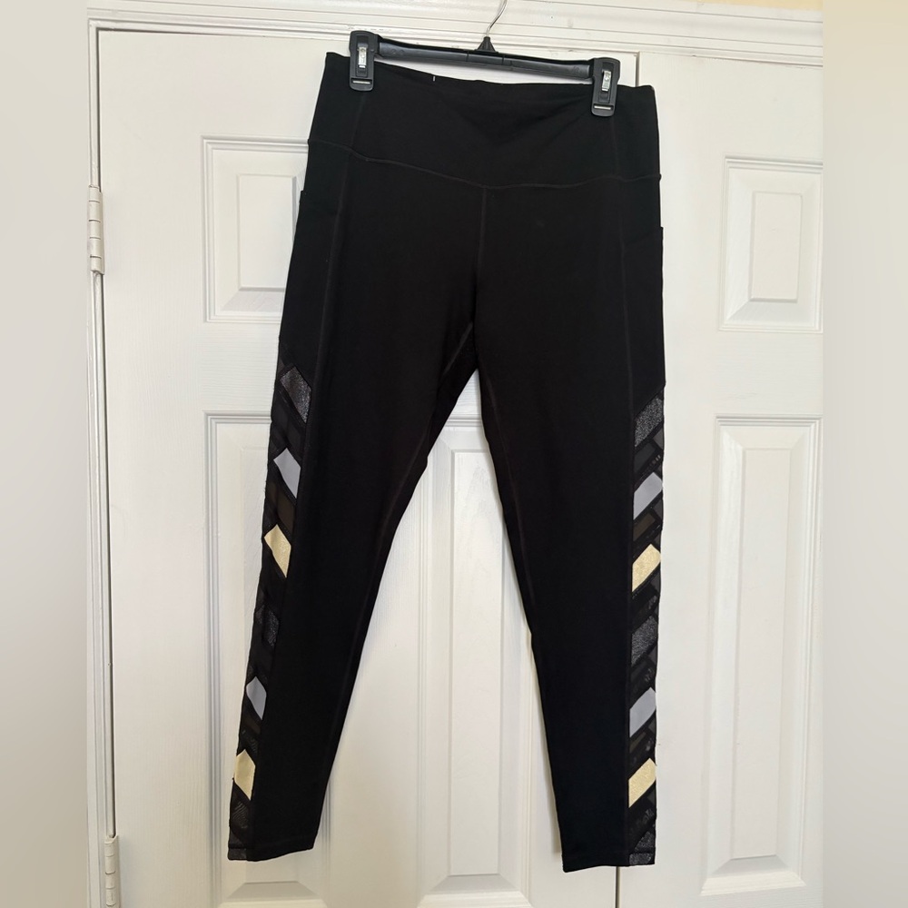 Used Victoria Secret black leggings size large. Pilling between thighs.